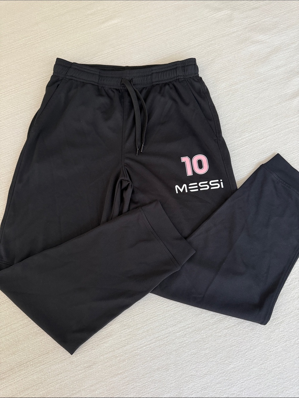 #10 MESSI Black Athletic Jogger Pants.  XL
2 snags rear/highlighted in yellow.